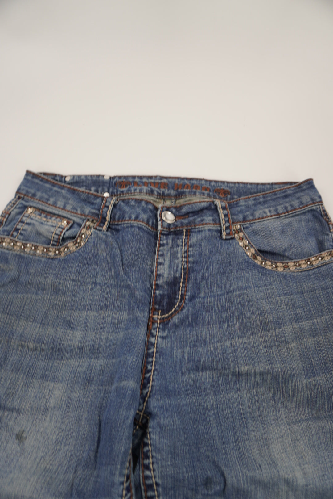 live hard flared pants