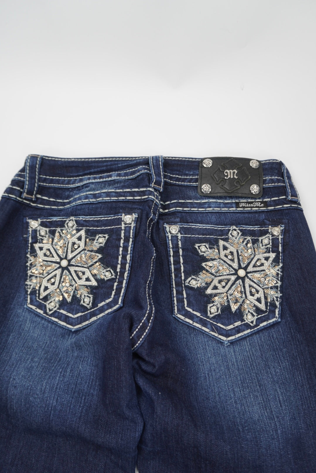 Miss Me mid-rise boot pants