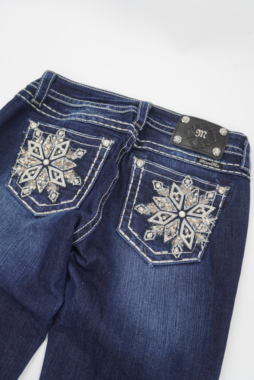 Miss Me mid-rise boot pants