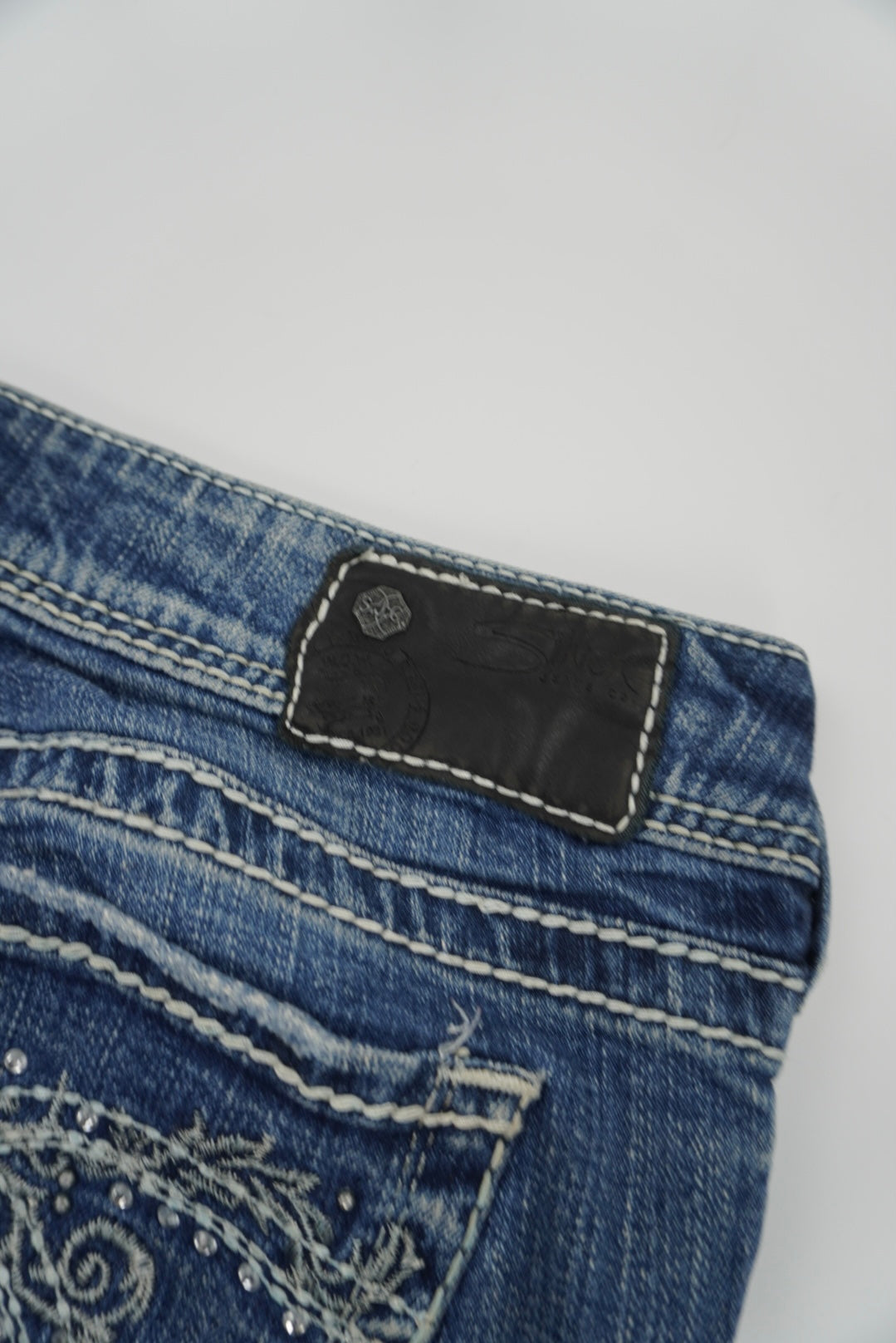 silver jeans suki flared pants